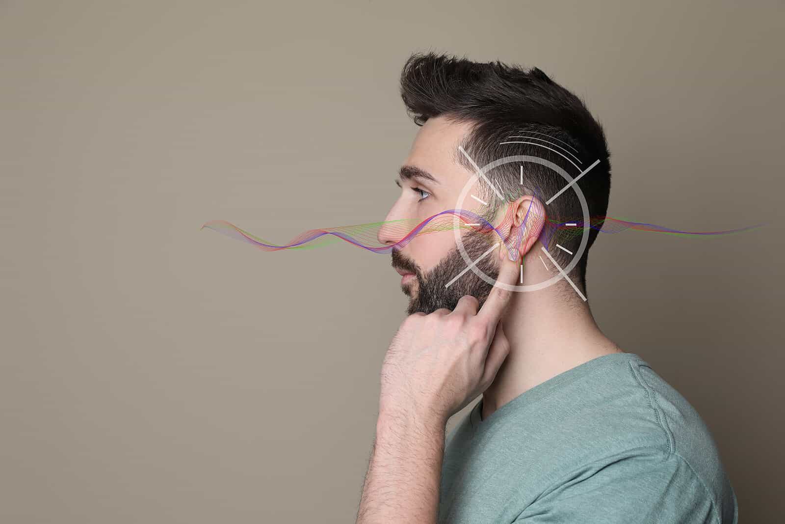 man with conceptial hearing loss image over ear